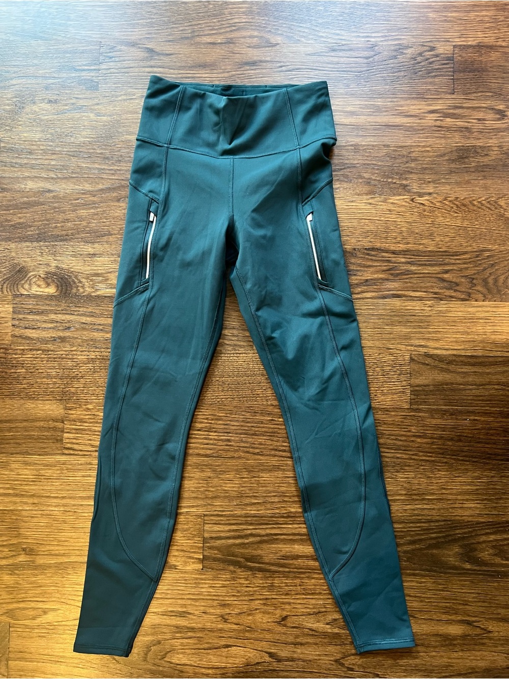 Athleta Teal High-Rise Performance Leggings with Zip Pockets